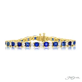 18K YELLOW GOLD BLUE SAPPHIRE AND DIAMOND TENNIS BRACELET